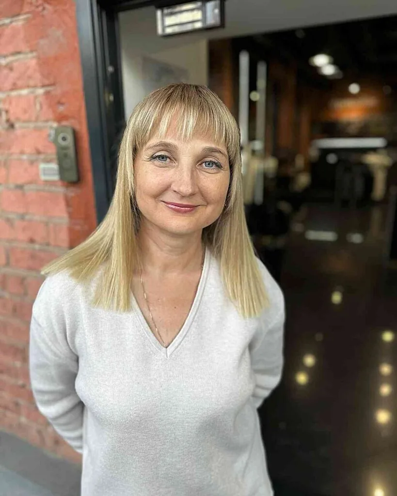 Medium-Length Sleek Blunt Thin Cut with Wispy Bangs for Women Aged 50 and Up