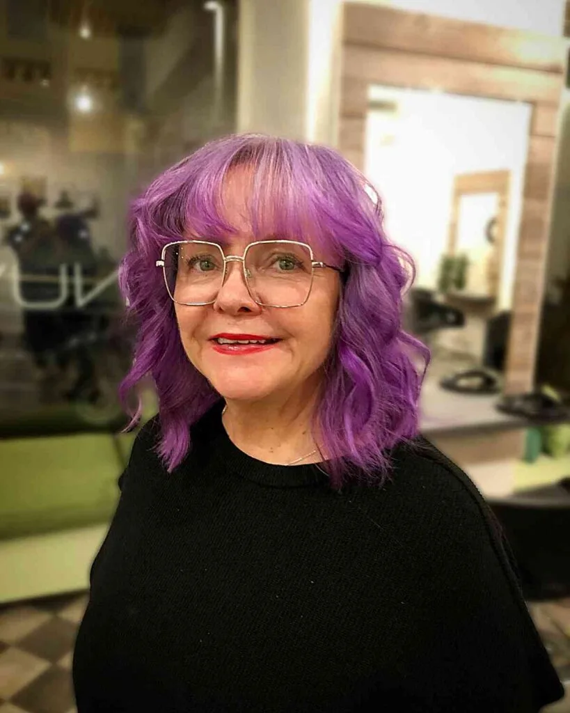 Mid-Length Wavy Violet Thin Hair with Airy Bangs for Women Over 50