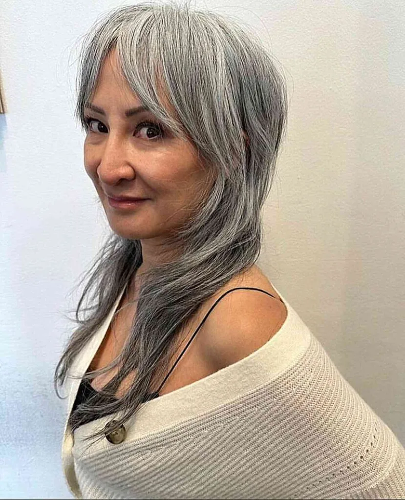 Mid-Long Razor Cut Shaggy Hair with Face-Framing Bangs for Thin-Haired Women Over 50