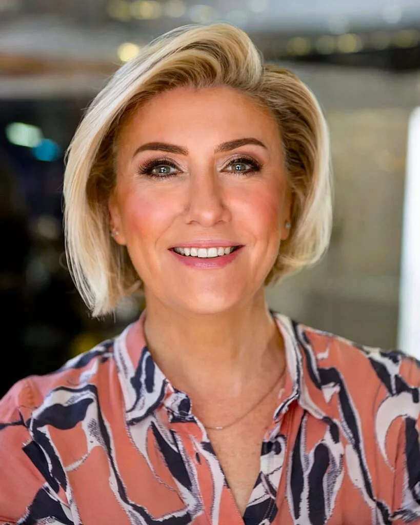 Short Asymmetric and Side Parted Blonde Bob for Ladies Aged Fifty