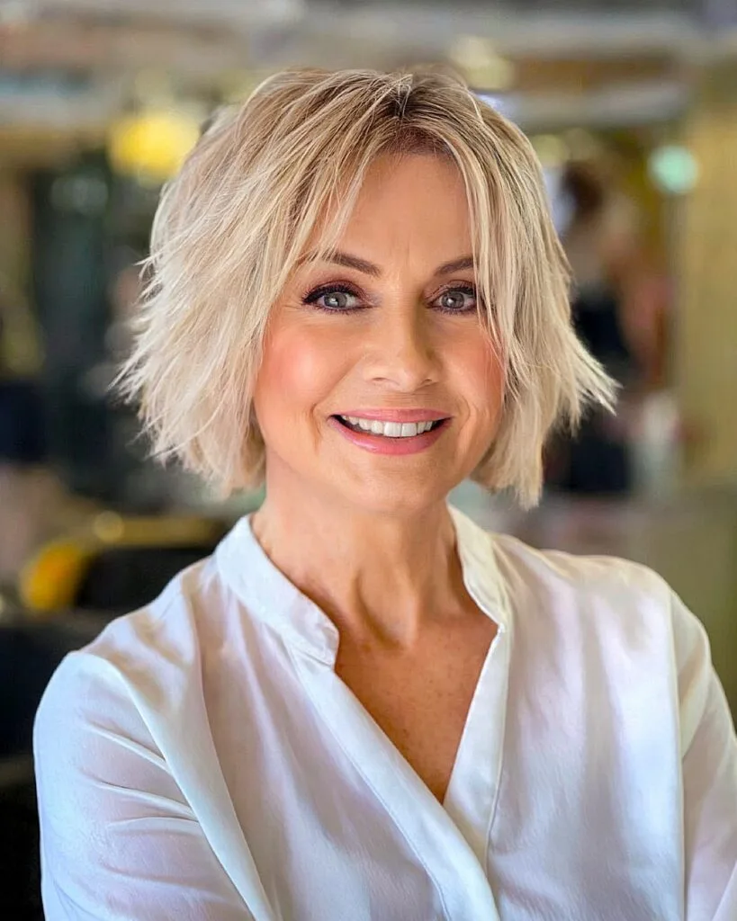 Short Blonde Bob with Flicked-Out Ends for 50-year-olds