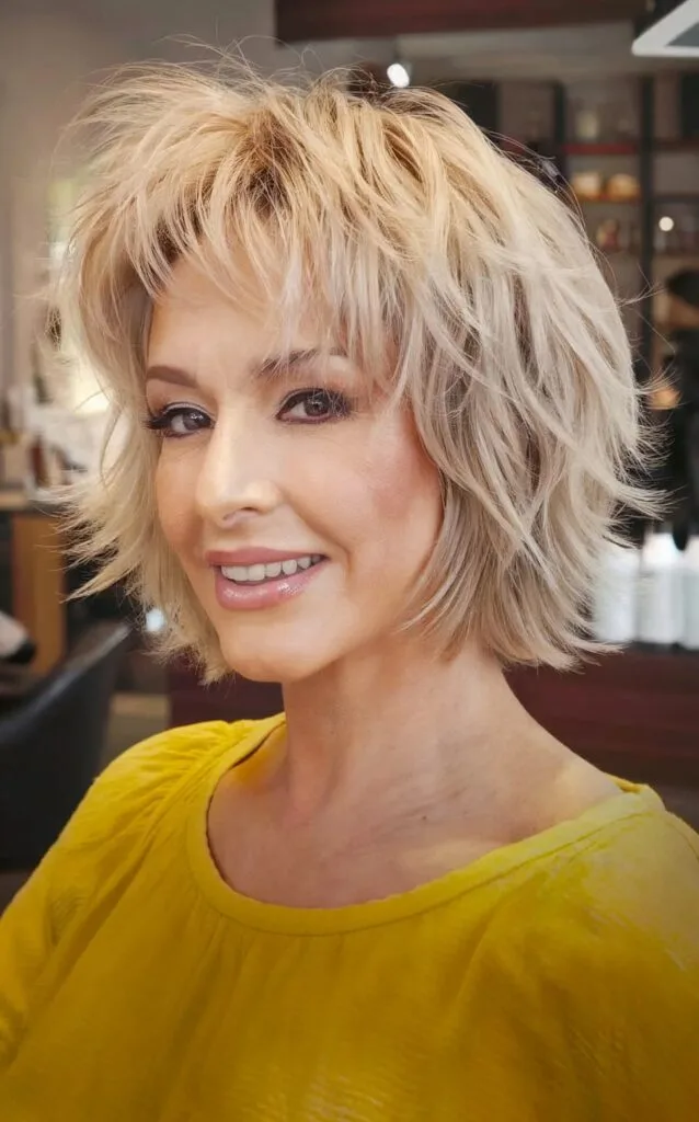 Short Textured Bob Cut on Wavy Hair for Women in Their Forties