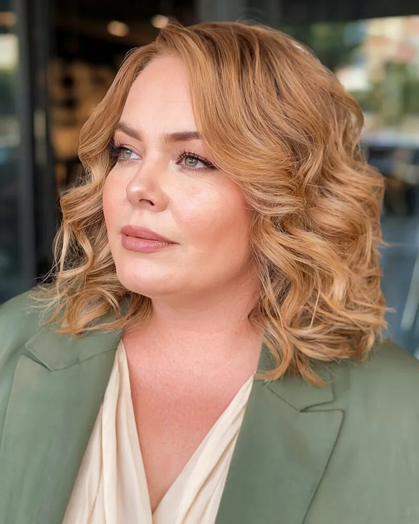 Side-parted blonde lob with soft curls for women over 40 with round face shapes