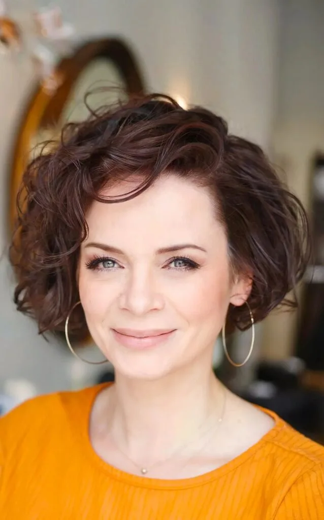 Side-Swept Short Curly Hair for 40-Year-Old Women