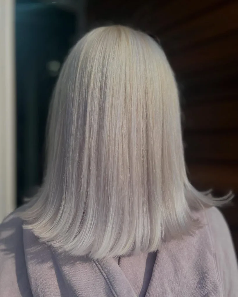 Sleek Blunt Cut with Iridescent Platinum Blonde Highlights