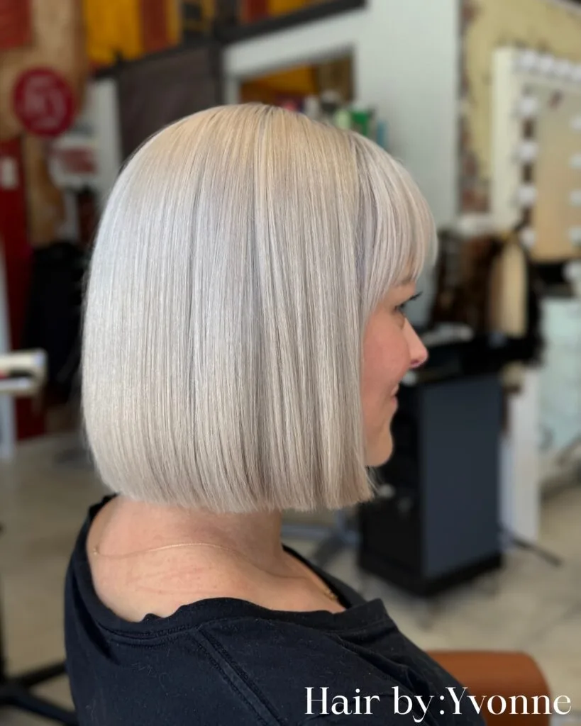 Sleek Blunt Platinum Blonde Bob with Bangs