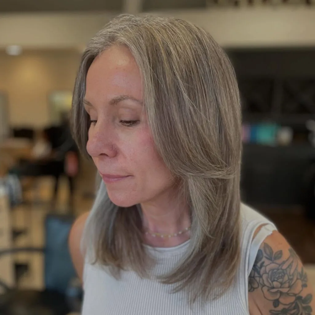 Sleek Layered Ash Gray with Subtle Blonde Highlights