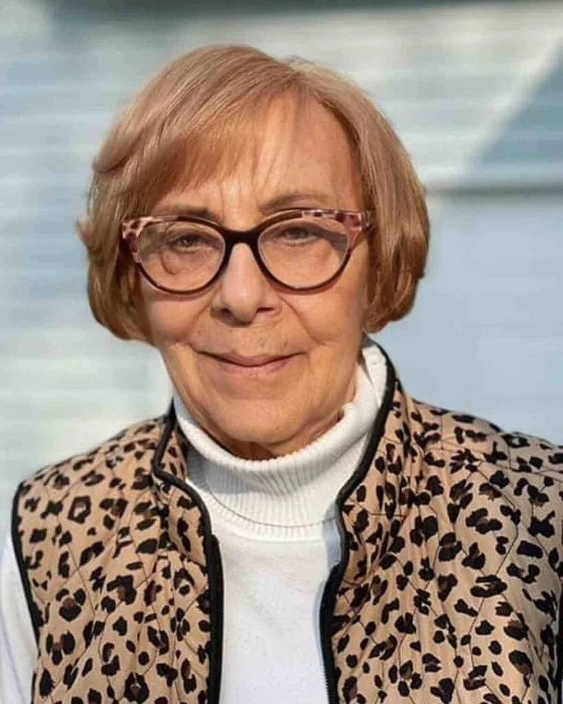 Soft Ear-Length Bob with Side-Swept Bangs for 60-Year-Olds with Glasses