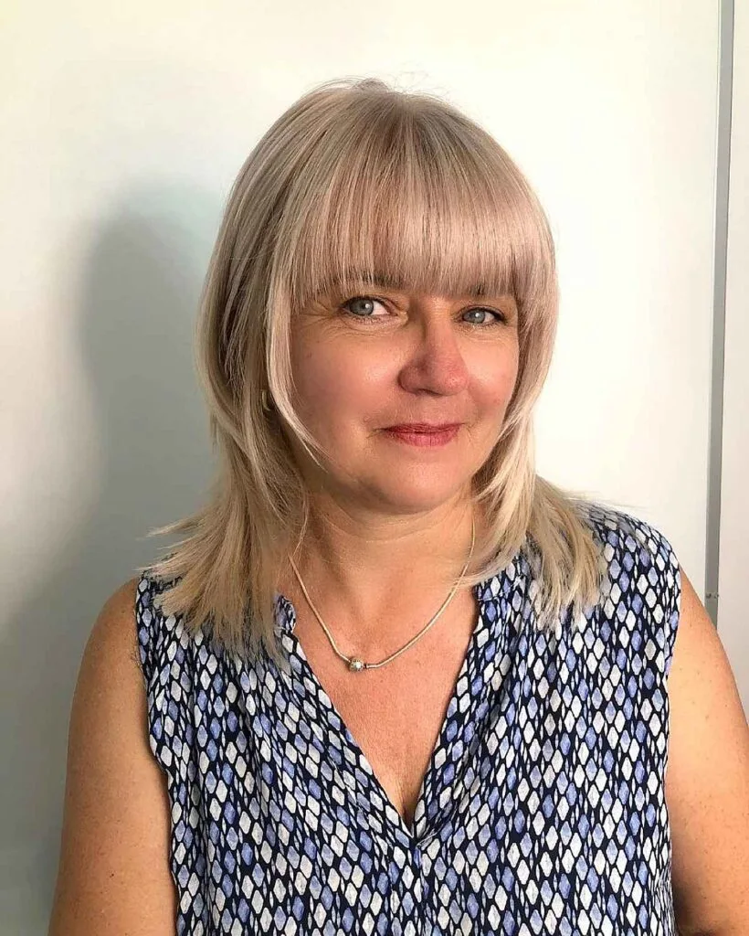 Soft Feathered Layers and Gentle Bangs