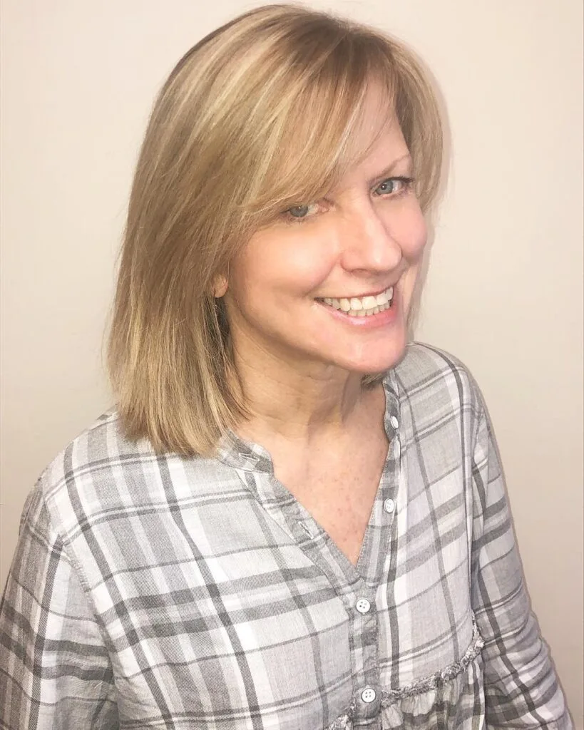 Soft Layered Cut with Graceful Side-Swept Bangs
