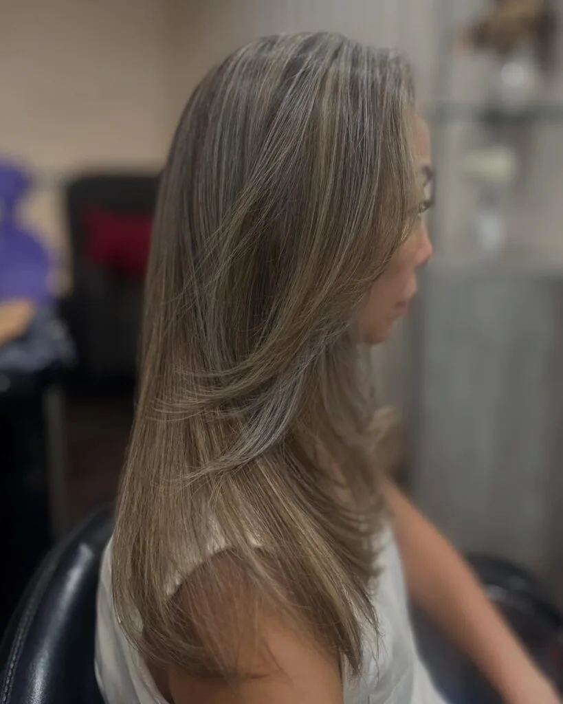 Stylish Long Layered Ash Blonde with Subtle Gray Highlights