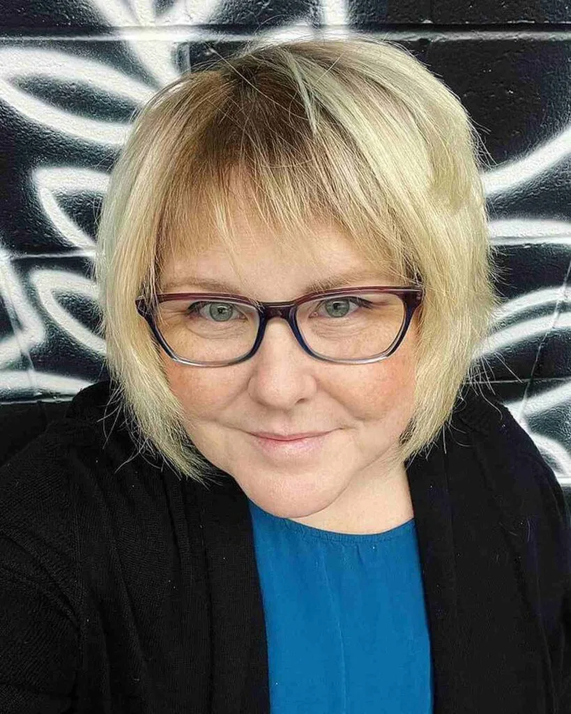 stylish short choppy bixie cut for women over 50 with thin hair