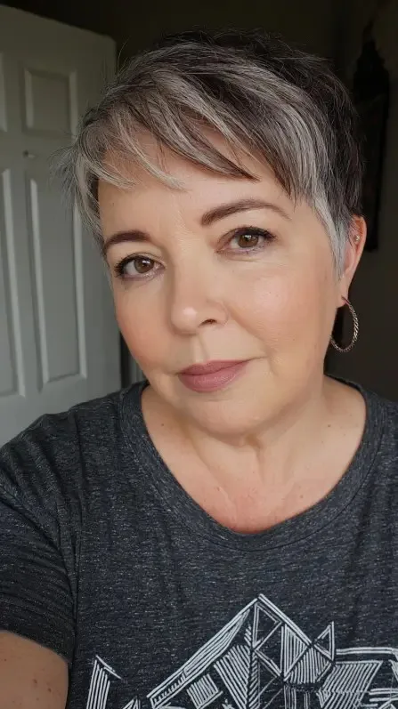 Textured Ash Blonde Pixie Cut with Subtle Highlights