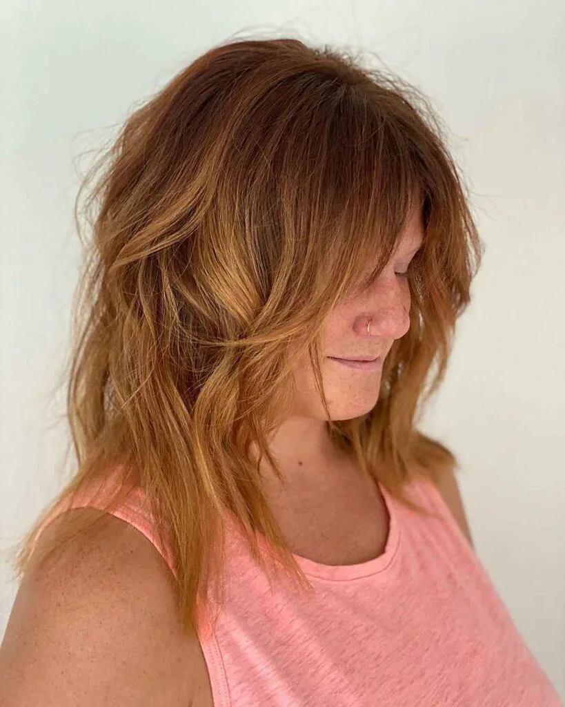 Trendy Shag for Women Over 40 with Round Faces
