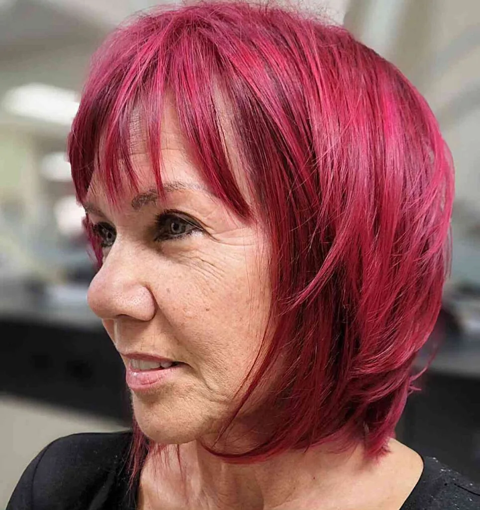 Vibrant Cherry Red Hair Color for Women Aged 50