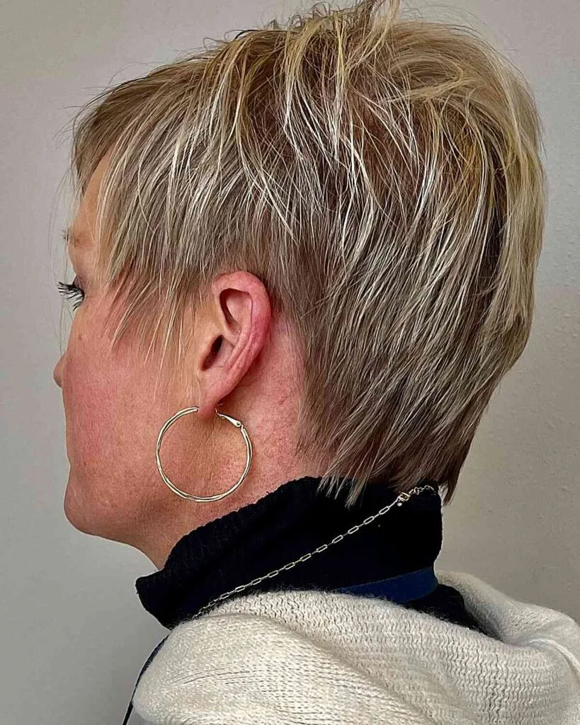 Chic Golden Blonde Balayage Pixie Hairstyle with Choppy Layers for Mature Women with Fine Hair