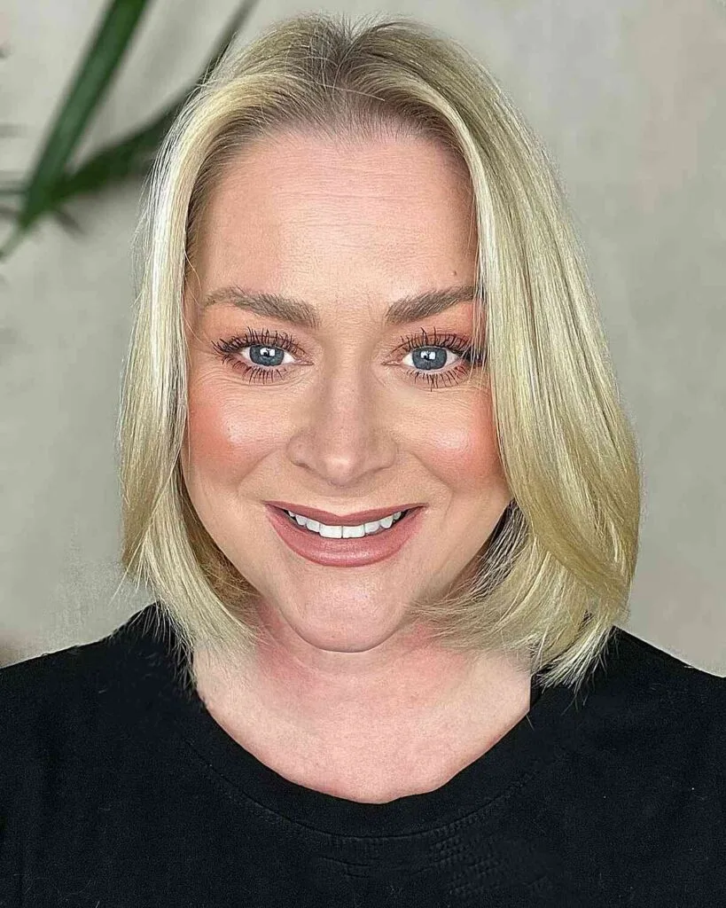 Chic Neck-Grazing Long Bob with Framing Layers for Women Over 50