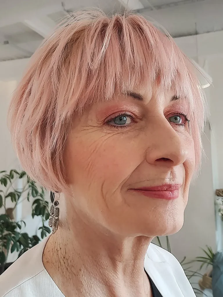 Chic Pink Bob with Bangs for Women Over Sixty