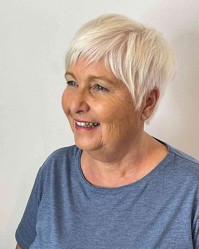 Chic White Pixie Cut with Soft Bangs on Fine-Haired Women Over 50