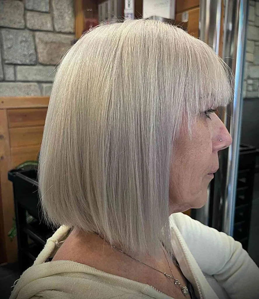 Chic White-Platinum Straight Bob Haircut for Ladies Past 60 with Fine Hair