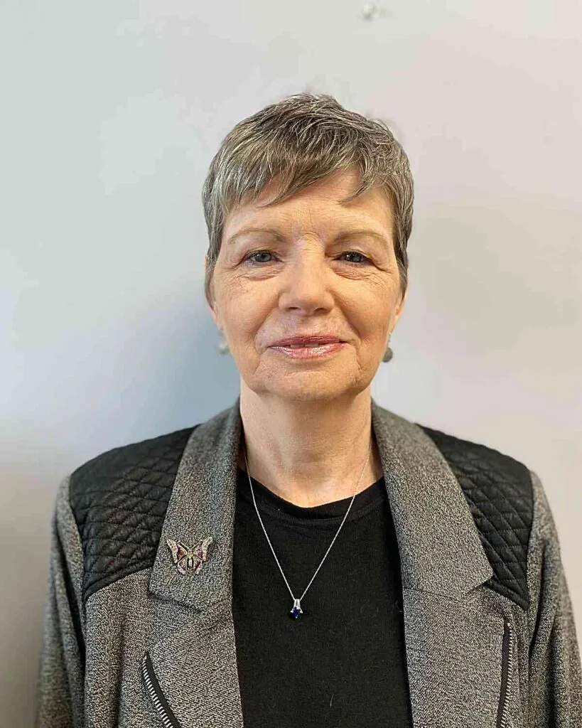 Effortless Razor Cut Pixie with Bangs for Older Women Past 50 with Grey Hair
