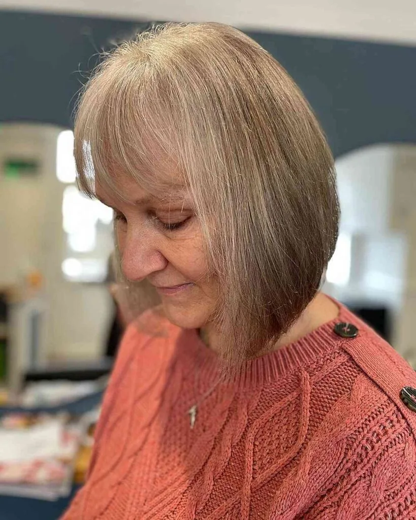 Elegant Long Inverted Bob with Bangs for Fine Haired Women Fifty and Up