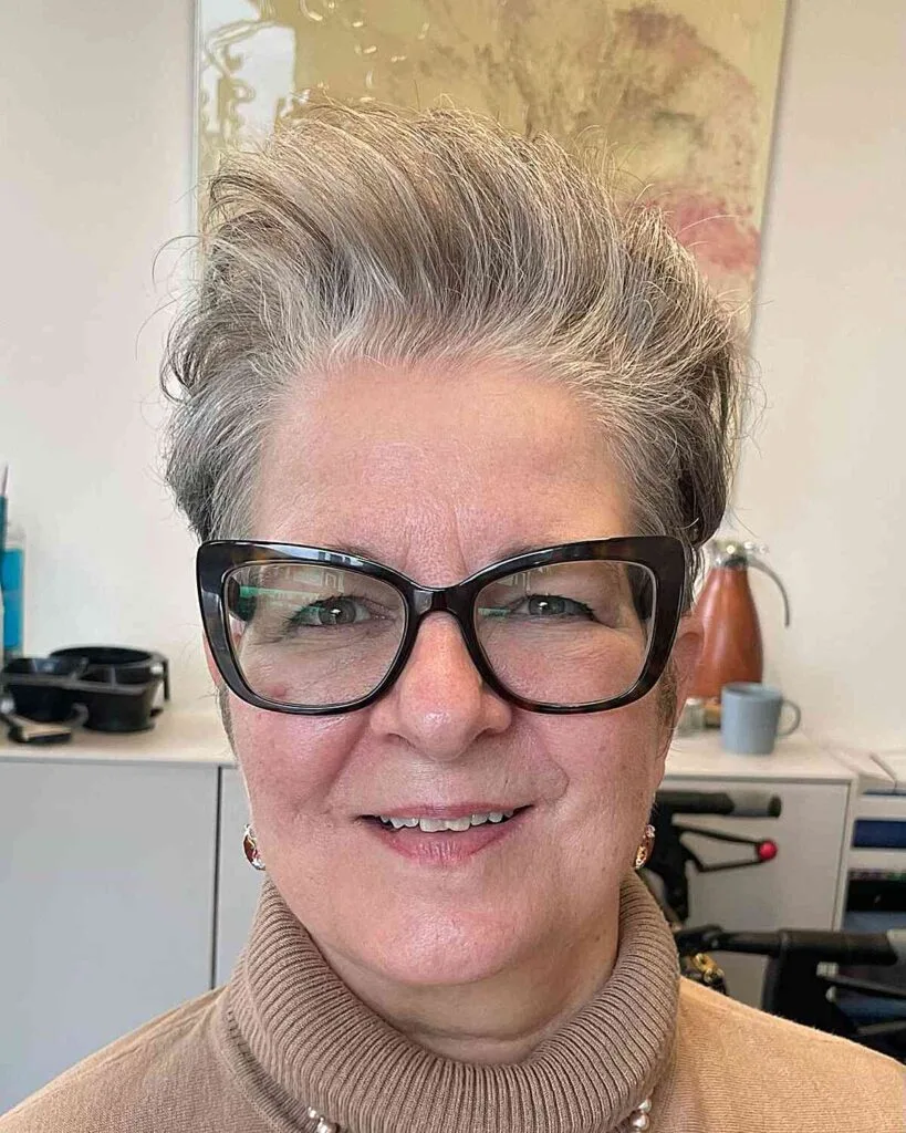 Elegant Pompadour for 50-Year-Old Ladies with Rounder Face Silhouettes, Fine Hair and Glasses