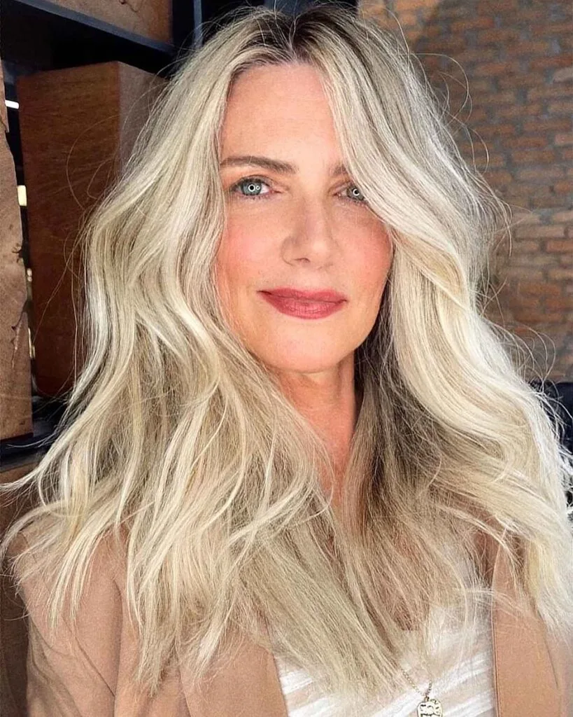 Messy Hairstyle with a Center Part for a Woman Over 40 with Fine Hair