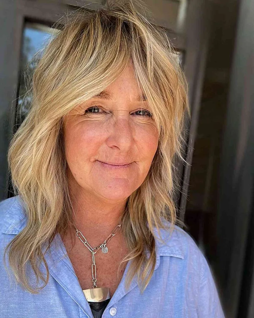 Mid-Length Classic Soft Shag for Ladies 50 and Over with blonde hair