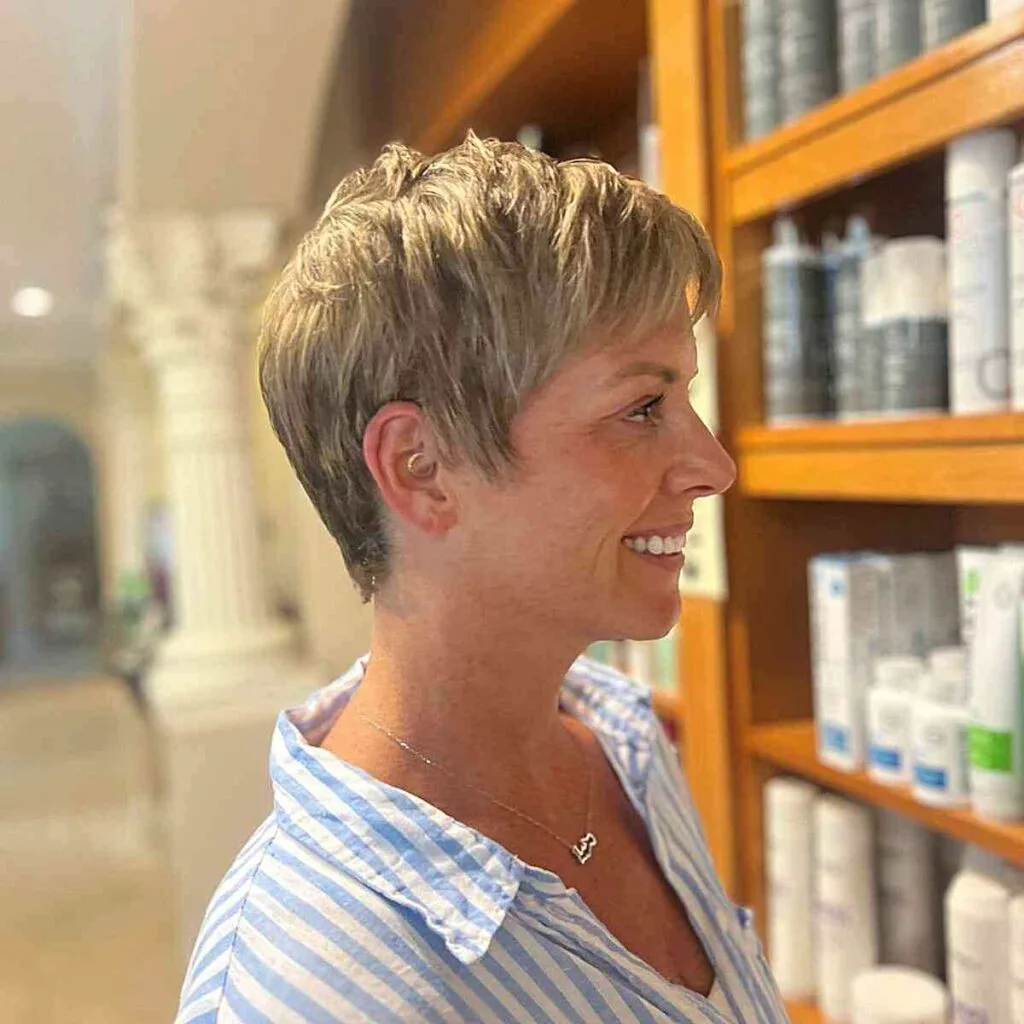 Pixie Hair with Subtle Highlights and a Side Fringe for women in their 50s with Fine Hair