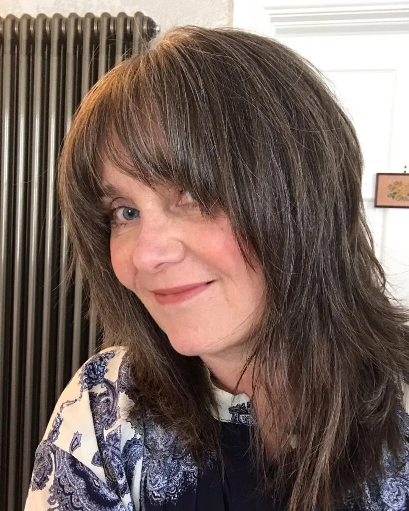 Shag hairstyle with bangs for mature women
