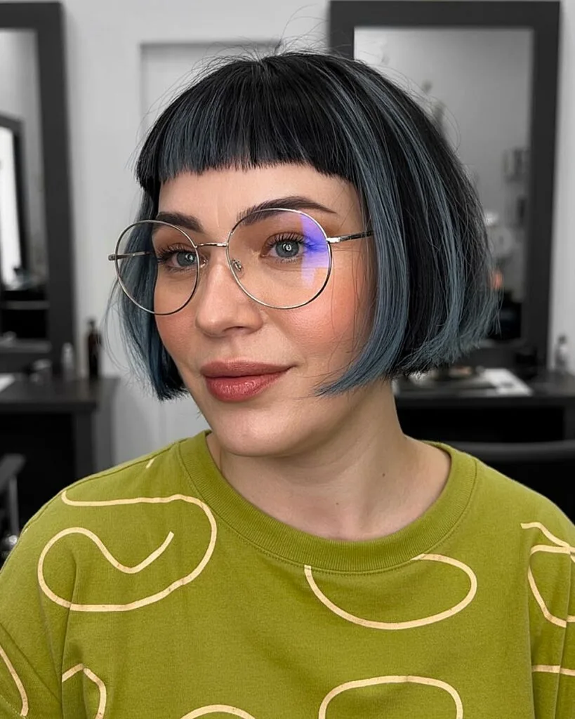 Short cropped bob with micro bangs for over 40 women seeking a bold, edgy short hairstyle