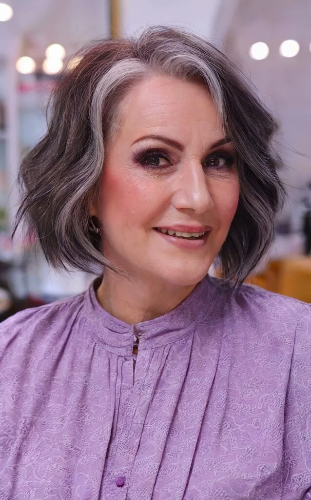 Short Face-Framing Bob Hairstyle with Side Part for Women Over 50