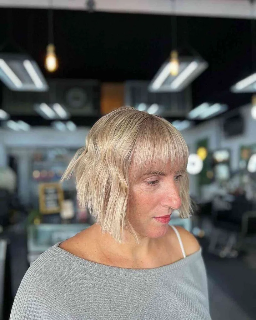 Short Textured Bob with Sleek Bangs for Women Over 50