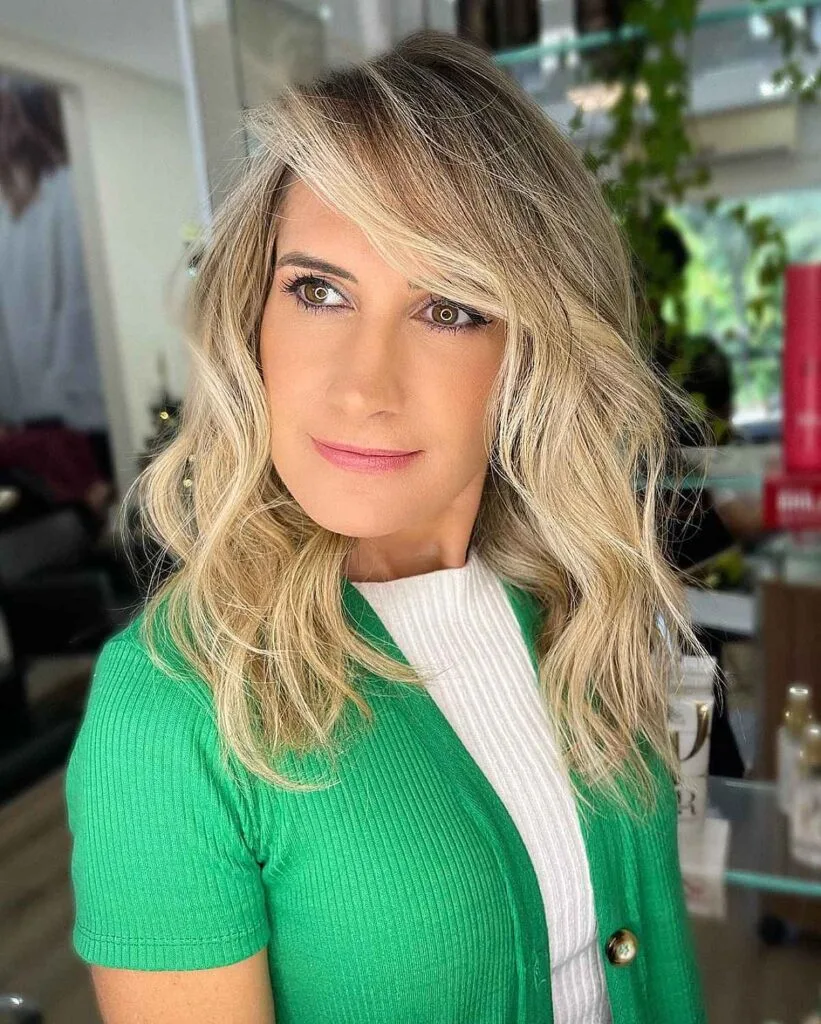 Soft Waves with a Dramatic Side Part for Woman Over 40 with Thin Hair