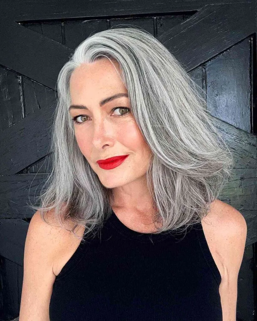 Softly Layered Silver Long Bob for a Lady Over 50