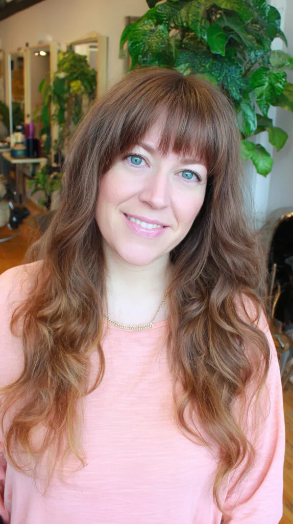 Textured Long Layers with Soft Curtain Bangs