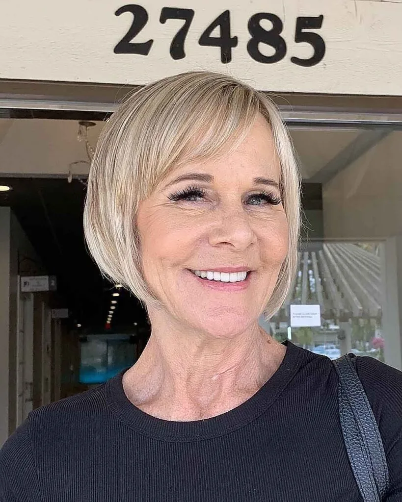 Textured Razor Cut Bob with Bangs for a Sixty-year-old who has fine hair