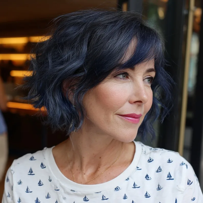 Textured Wavy Bob with Vibrant Blue Highlights