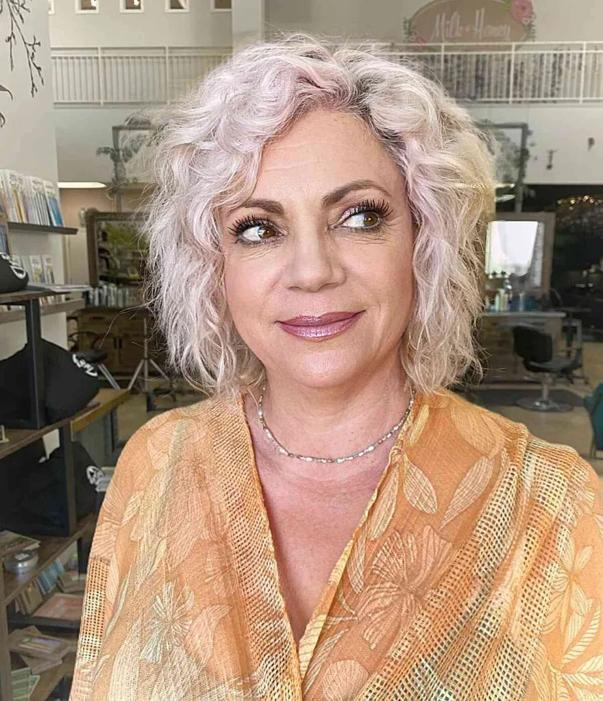 Triangular Short Bob for Women Over 50 with messy, tousled hair