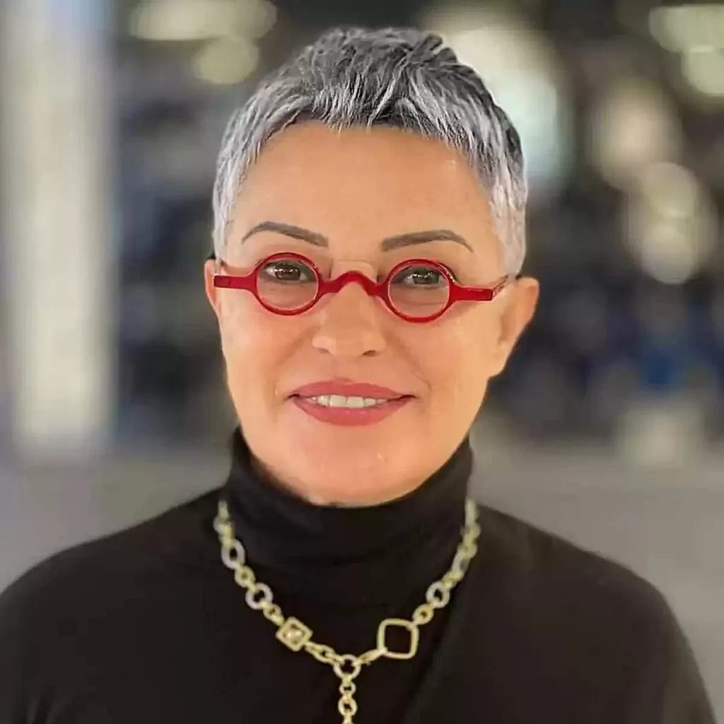 Elegant Silver Balayage on a Chic Short Haircut for 50-year-olds with Glasses