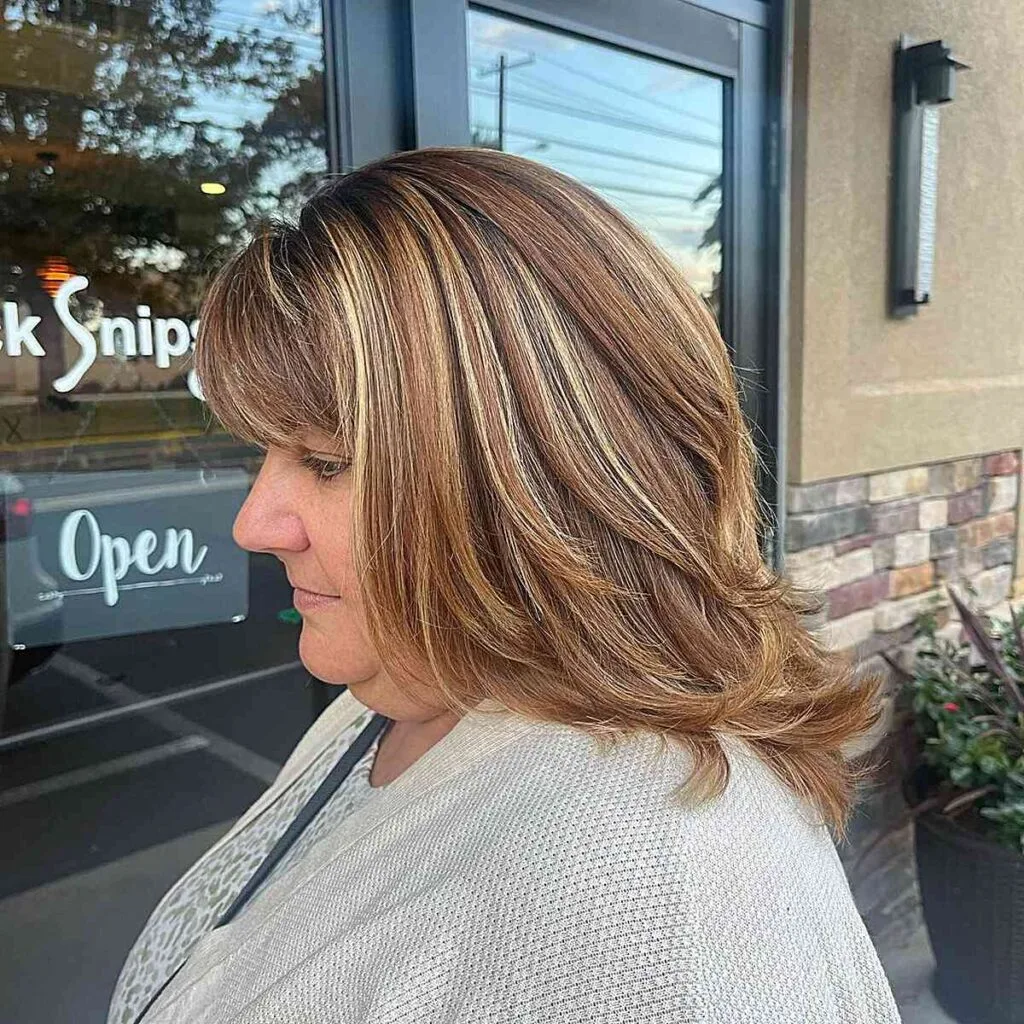 Feathered Mid-Length Hair with Bangs for Overweight Older Ladies Aged 50