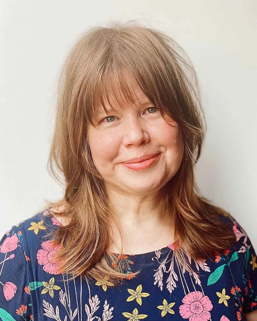 Haircut for fifty-year-old women with a Round Face Shape