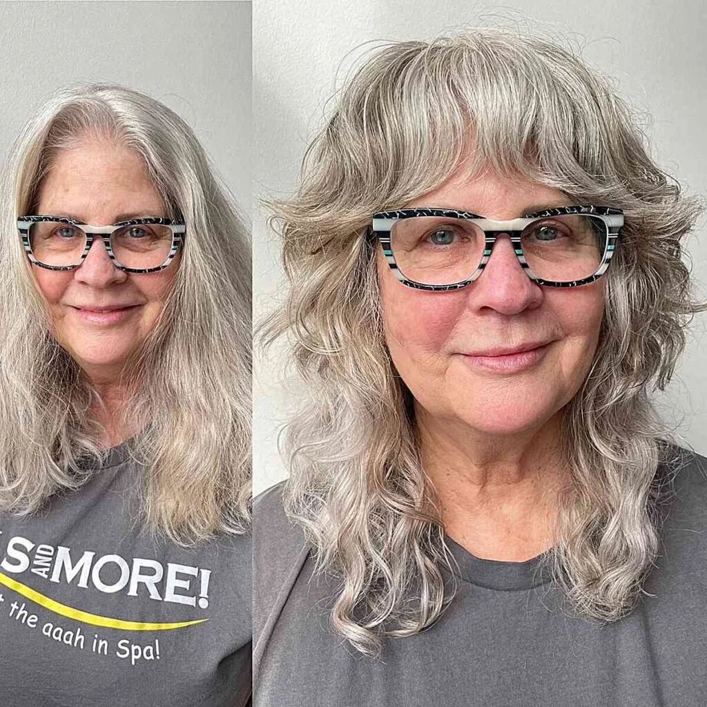 Mid-Length Salt and Pepper Shag with Bold Bangs for 60-Year-Olds