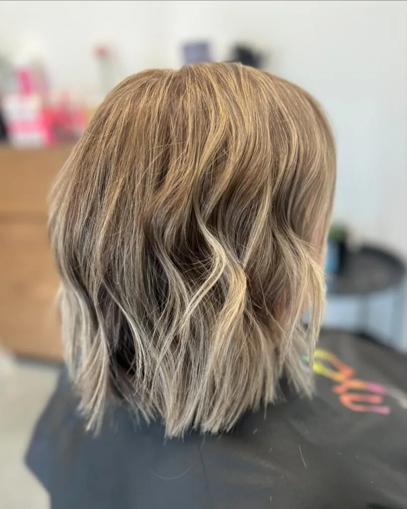 Modern Textured Wavy Bob with Caramel Highlights