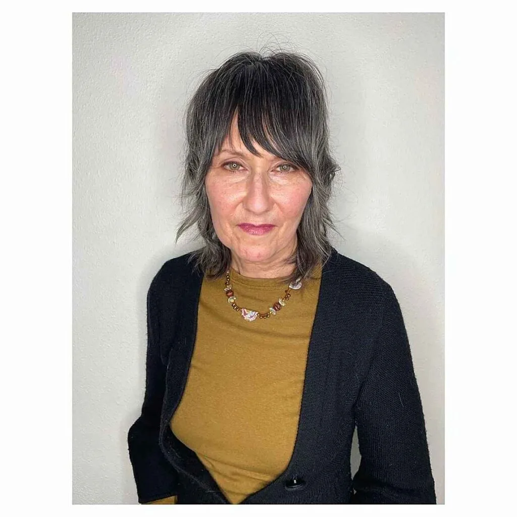 Shoulder-Length Shag with Bangs for Older Women with Fine Hair