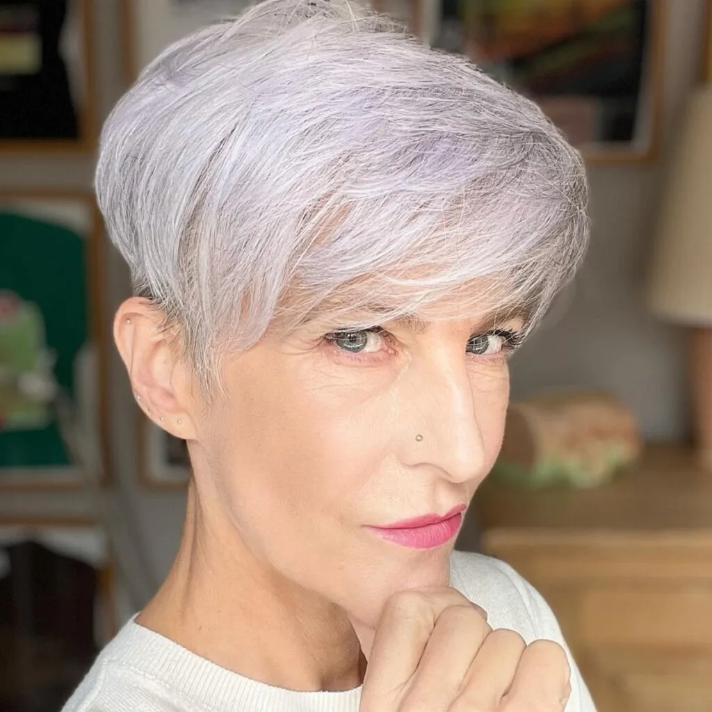 Stylish silver pixie with bangs for women over 50 with fine hair