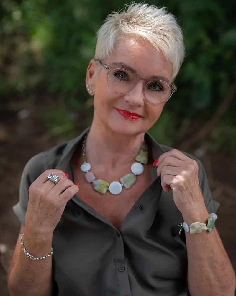 Stylish Ultra Short Hairstyle for women over 50 with glasses
