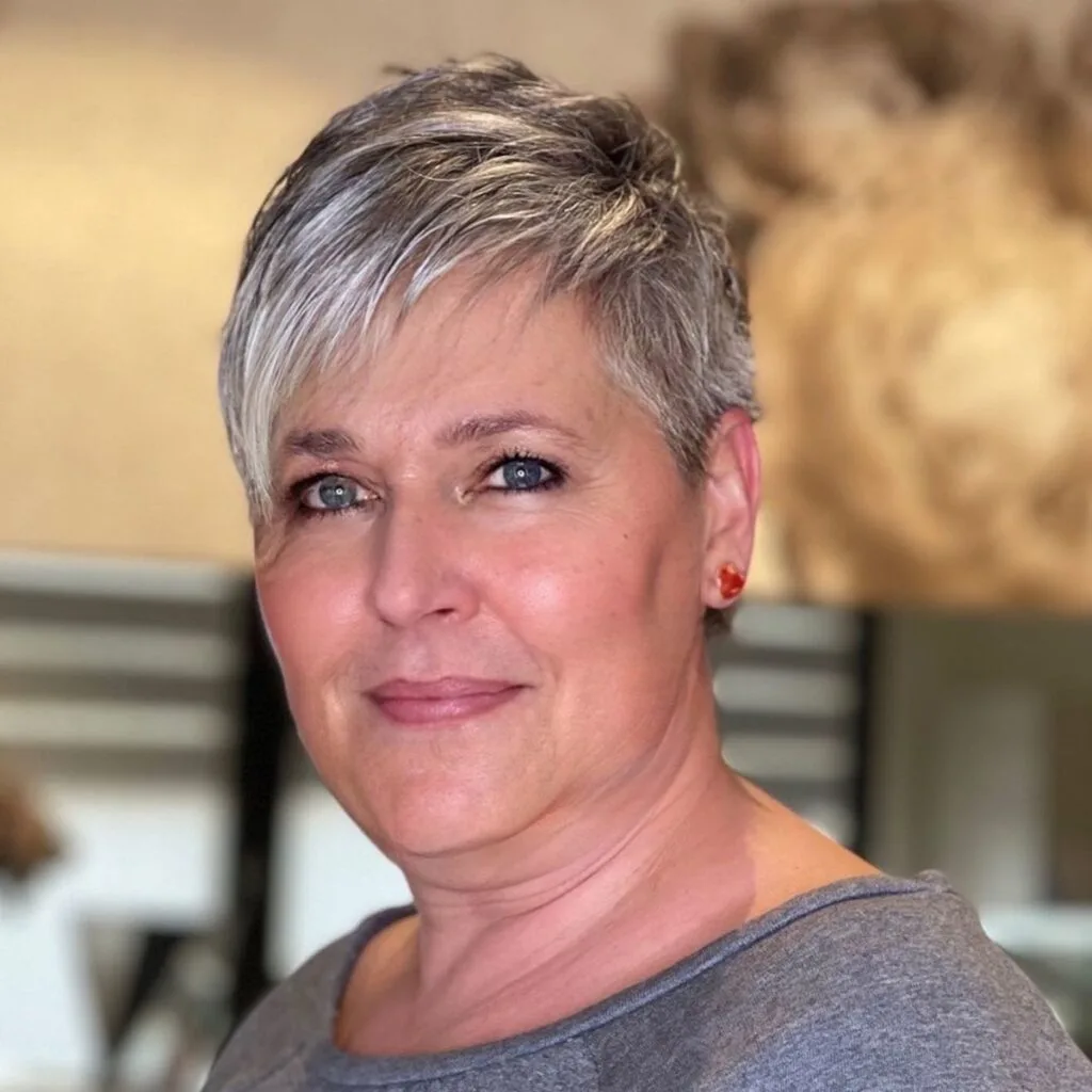 Tapered short hairstyle for women over 50 with fine hair