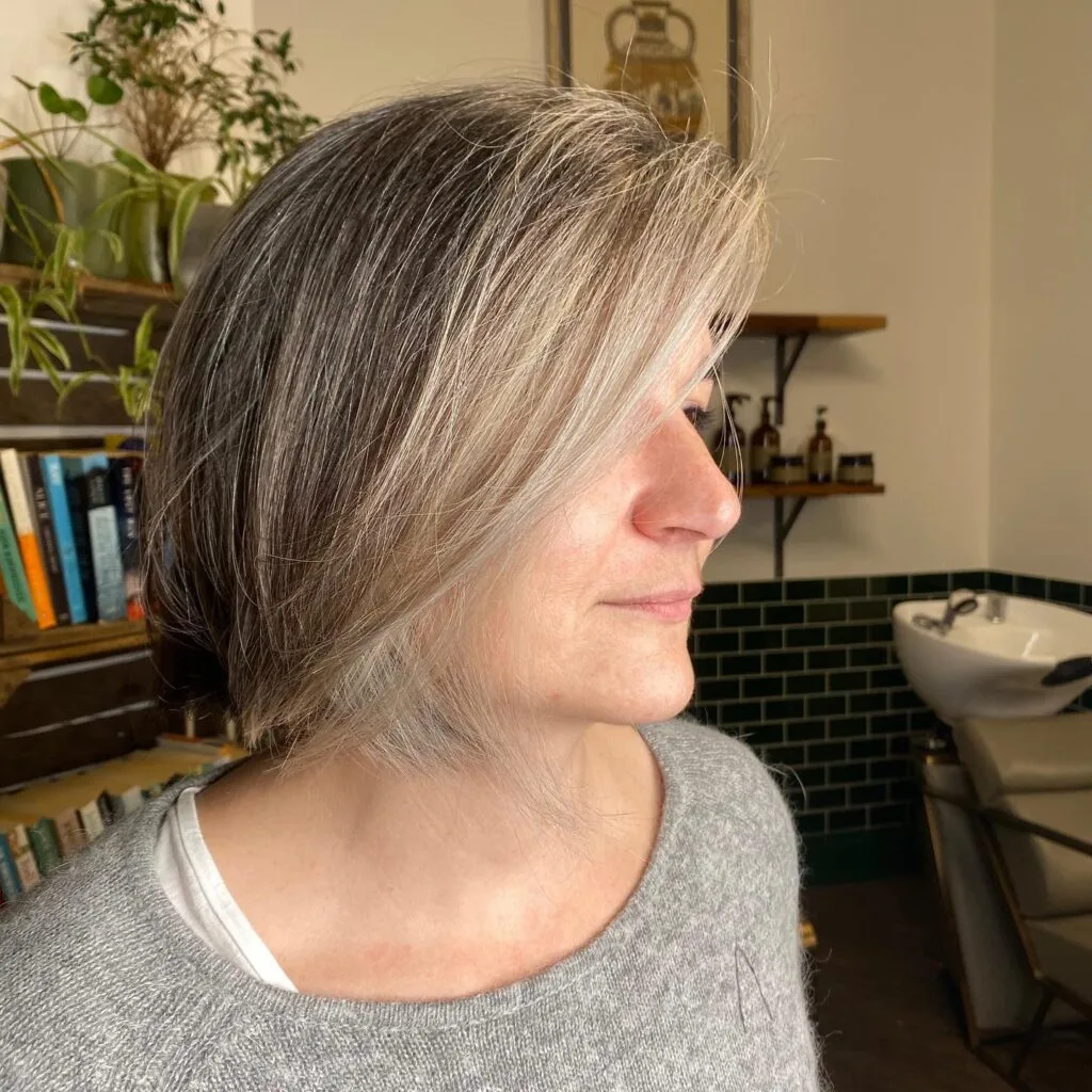 Textured Asymmetrical Bob with Soft Silver Highlights